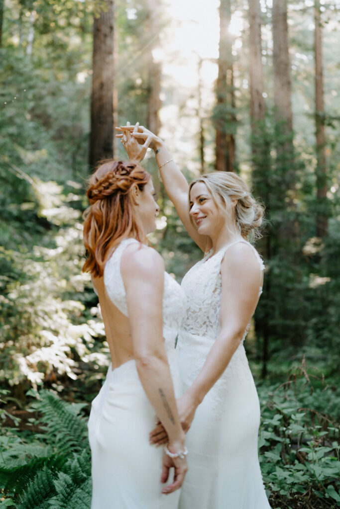romantic moments of brides surrounded by lush redwood trees at pfeiffer redwood state park