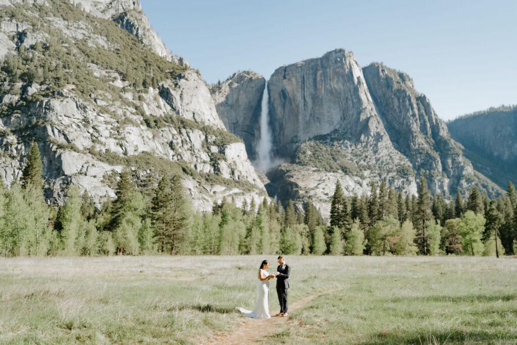 candid moments of bride and groom exchanging private vows in yosemite national park