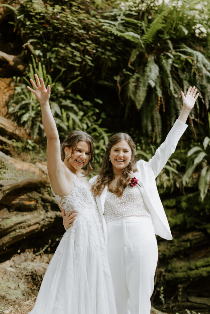 couple exchanging vows as they elope in California redwoods