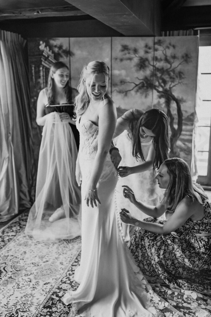 bride getting ready together with her friends