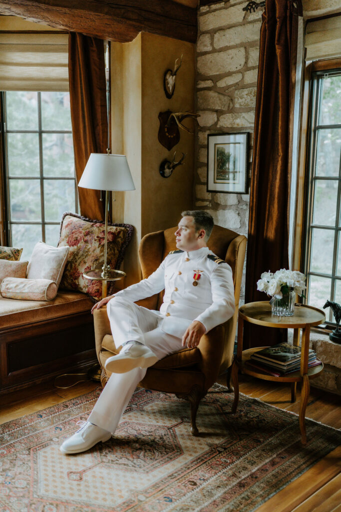 groom in a white military uniform
