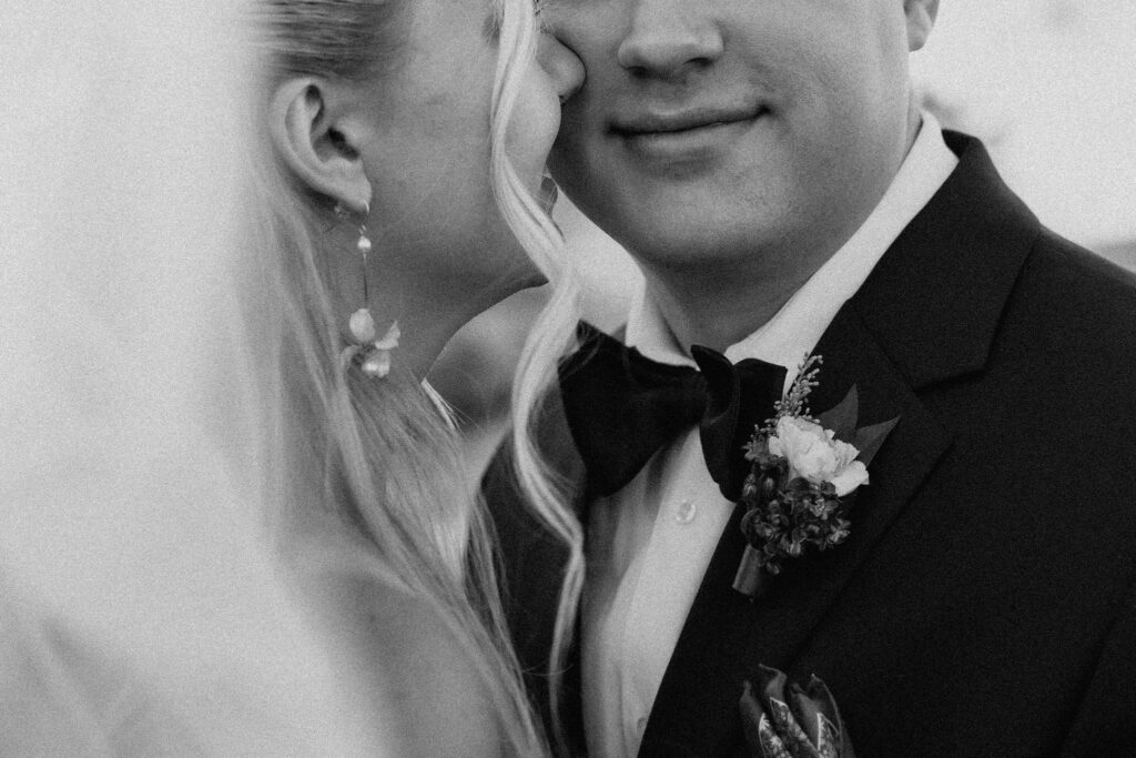 close up of bride and groom cheek to cheek