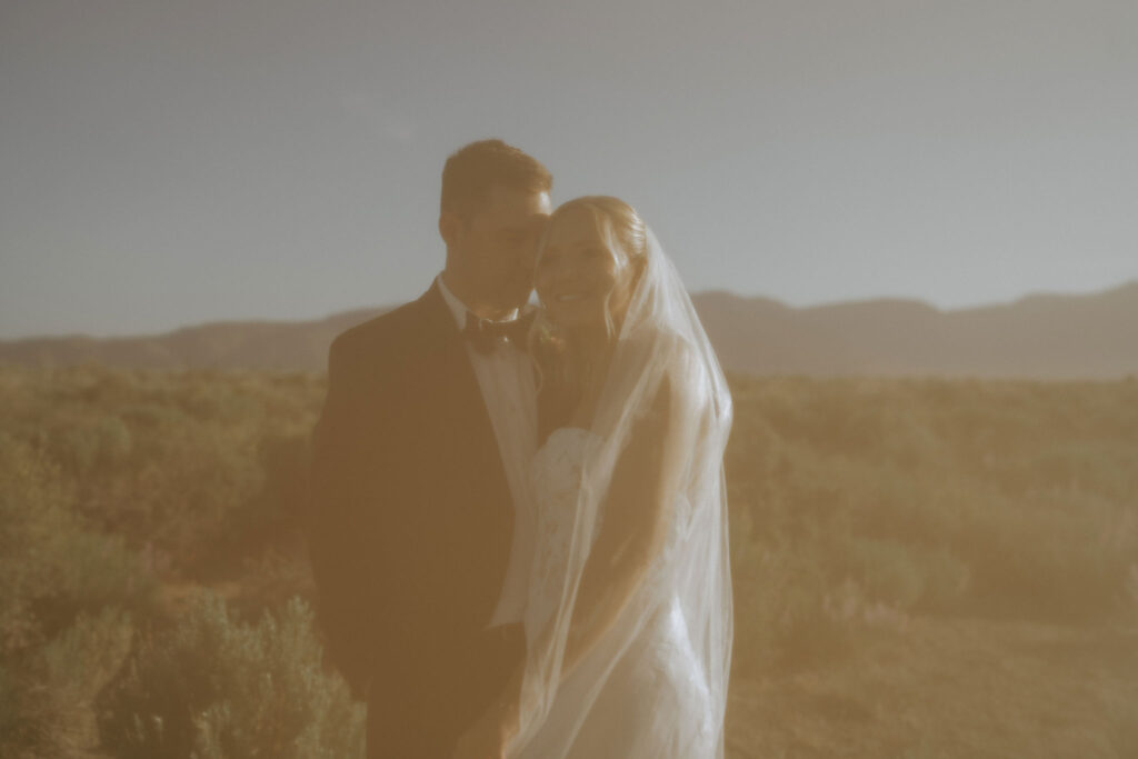 bride and groom going on a hike together during their adventure elopement