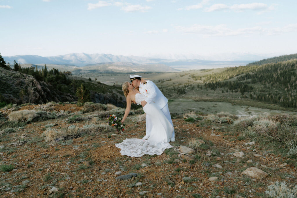 bride and groom dip kiss for a mammoth lakes elopement