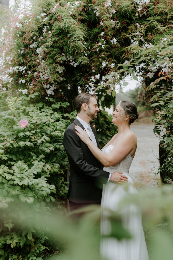 bride and groom in the gardens of lost whale inn, ca