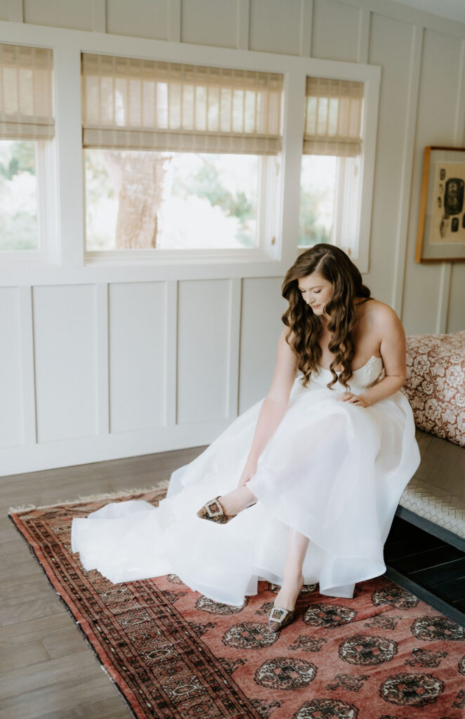 bride getting ready at a cozy airbnb