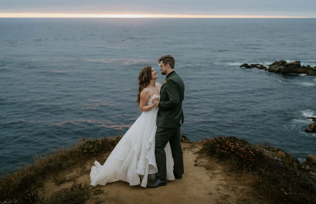bride and groom first dance on the bluffs in big sur