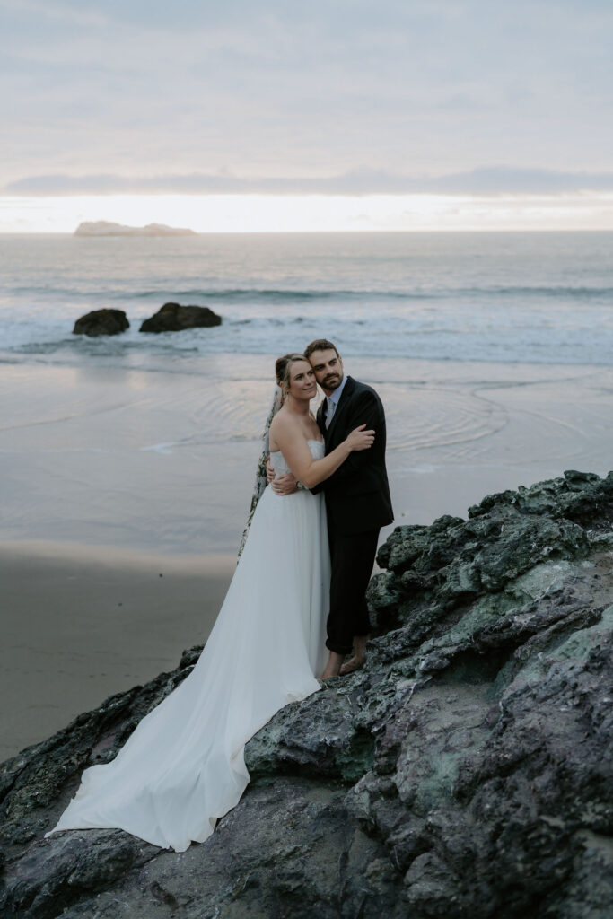 bride and groom barefoot at the shore during their Trinidad State Beach elopement