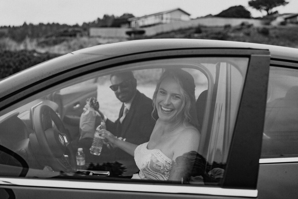 bride and groom in the car