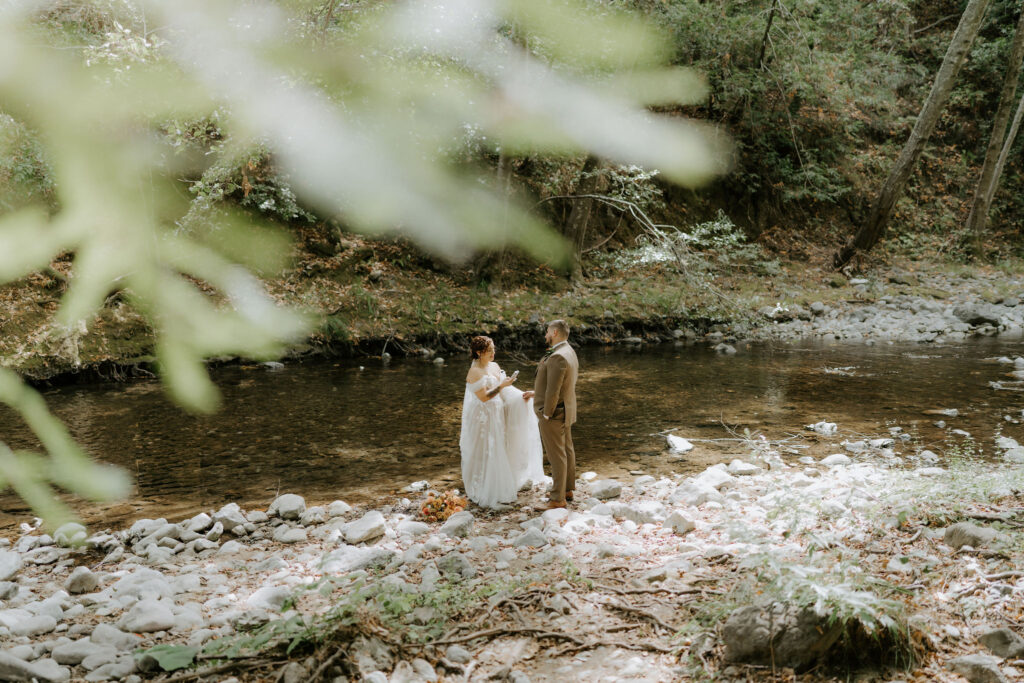 fall elopement ceremony along a babbling creek in glen oaks big sur