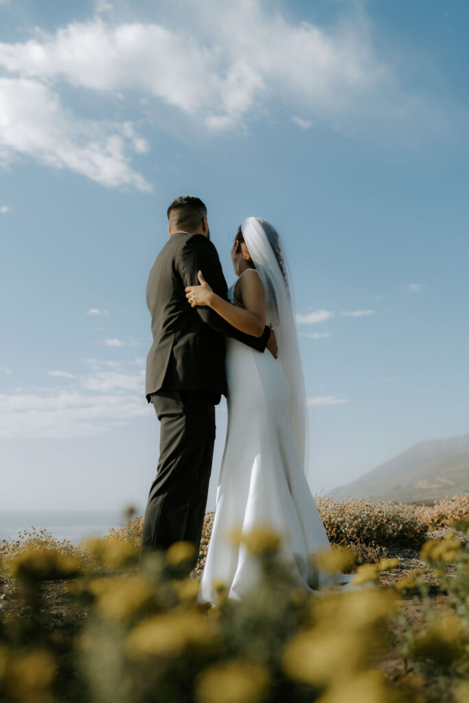 cute picture of the newlyweds holding hands