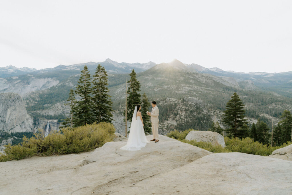 bride and groom holding hands during their elopement ceremony