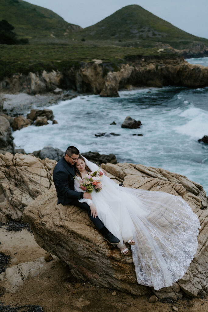 groom kissing the bride on the forehead