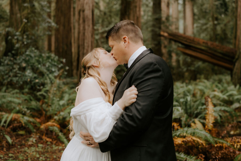 cute picture of the bride and groom kissing