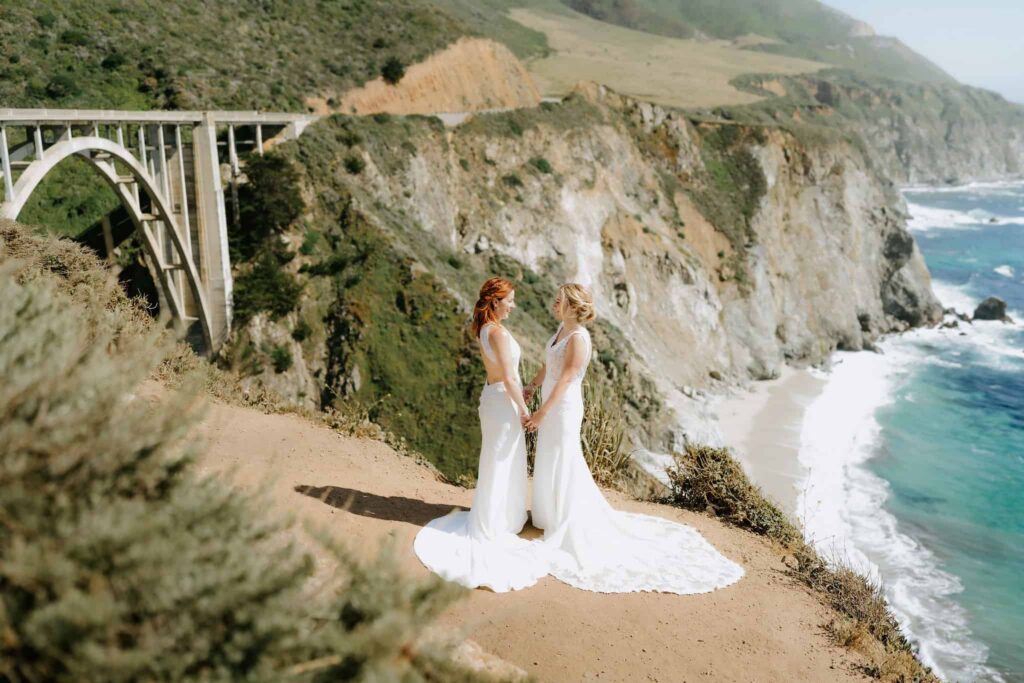 big sur eloping couple at Bixby Bridge overlooking the California coastline