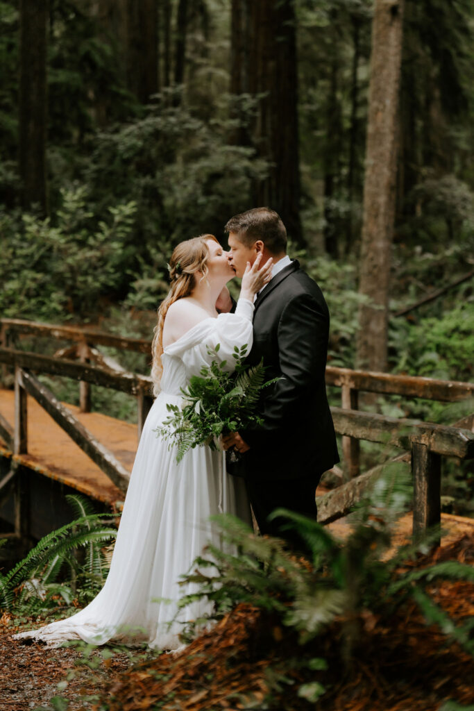 cute picture of the bride and groom kissing