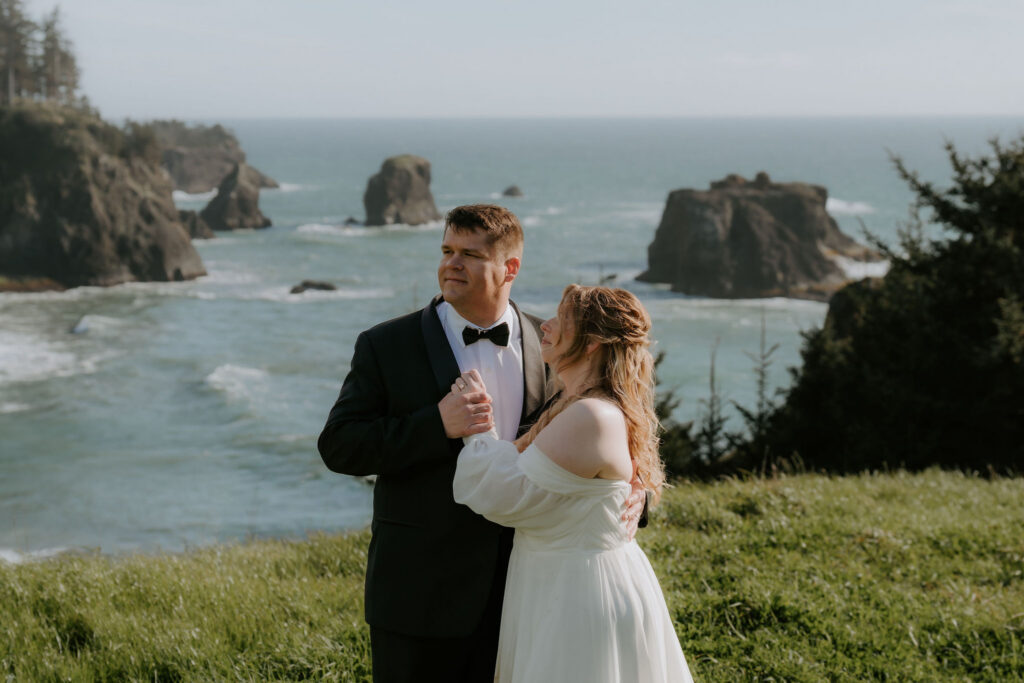 cute picture of the bride and groom laughing with each other