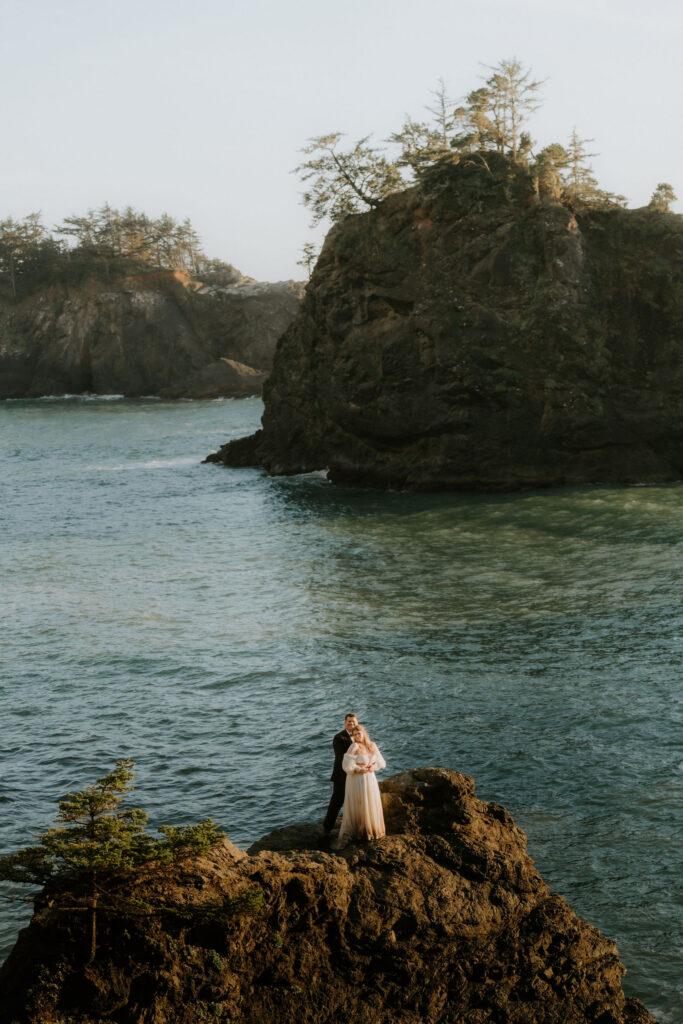 newlyweds hugging during golden hour