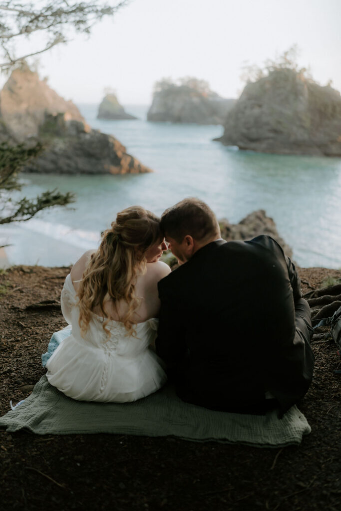 newlyweds laughing with each other during their photoshoot