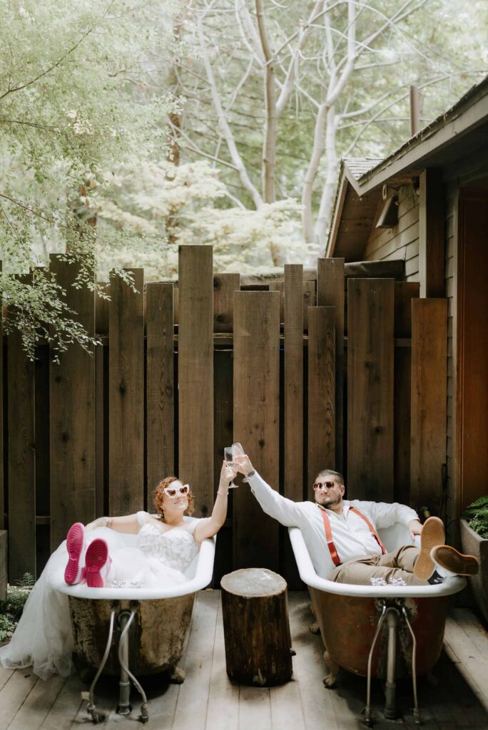 Big Sur elopement couple cheering at Glen Oaks hotel on wedding day
