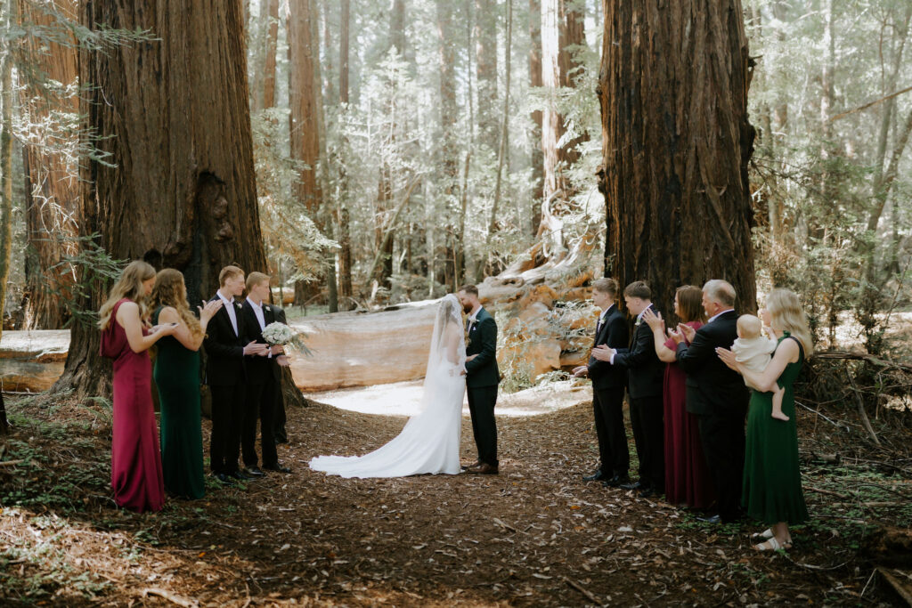 cute picture of the newlyweds kissing after their ceremony