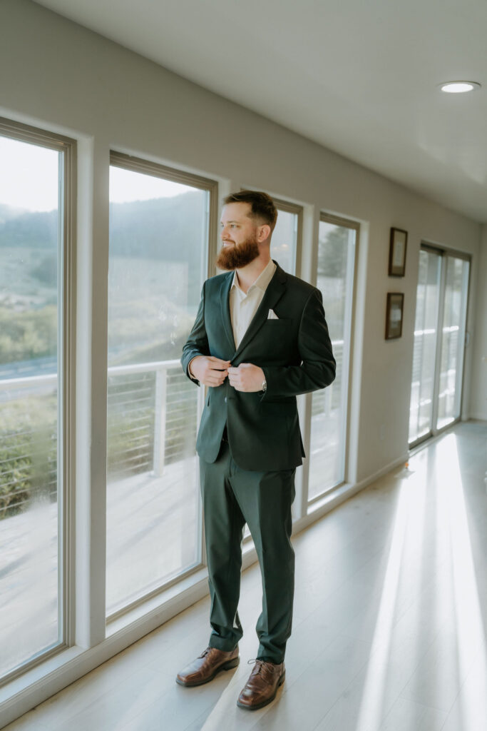 groom getting ready for his dream elopement