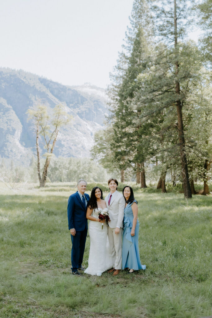 cute portrait of the newlyweds and their wedding guests