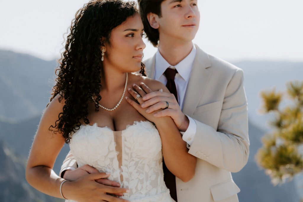 cute picture of the newlyweds hugging at taft point