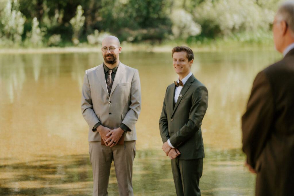 groom emotional watching the bride walk down the aisle