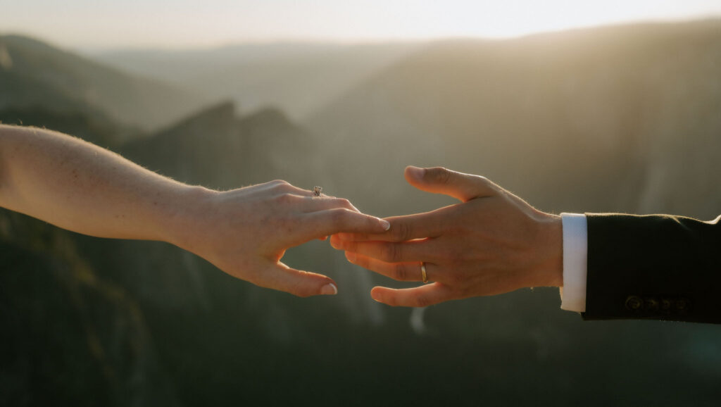 cute picture of the newlyweds holding hands