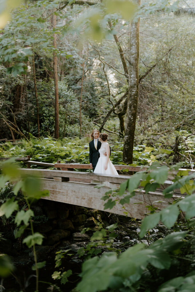 Bride and groom, smiling at each other