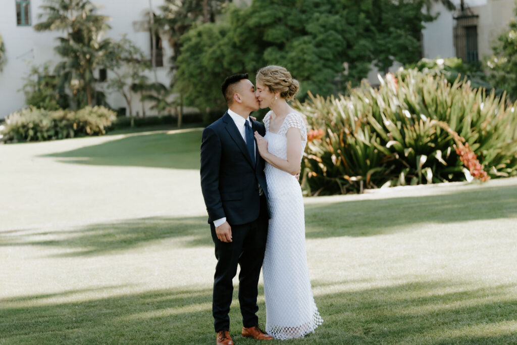 cute picture of the newlyweds kissing