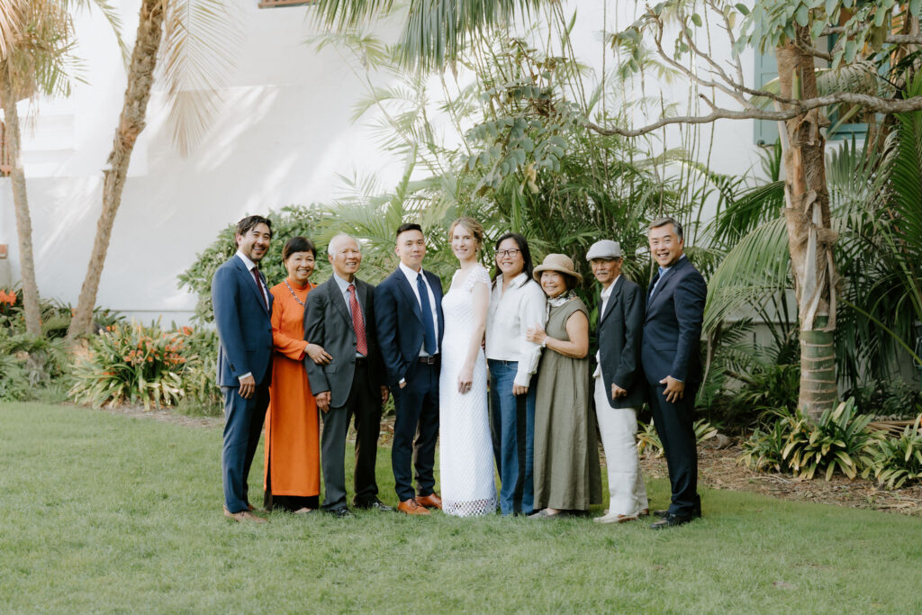 cute picture of the newlyweds and their families