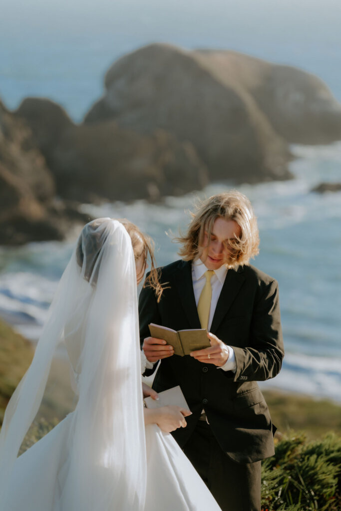 Bride and groom reading their private vows
