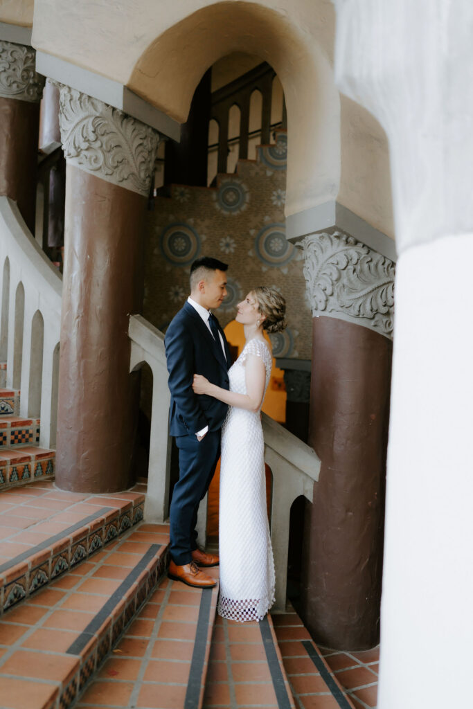 cute picture of the bride and groom smiling at each other