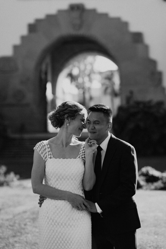 bride kissing the groom on the cheek