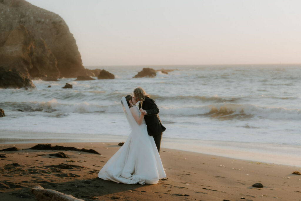 Romantic picture of the newly married couple kissing