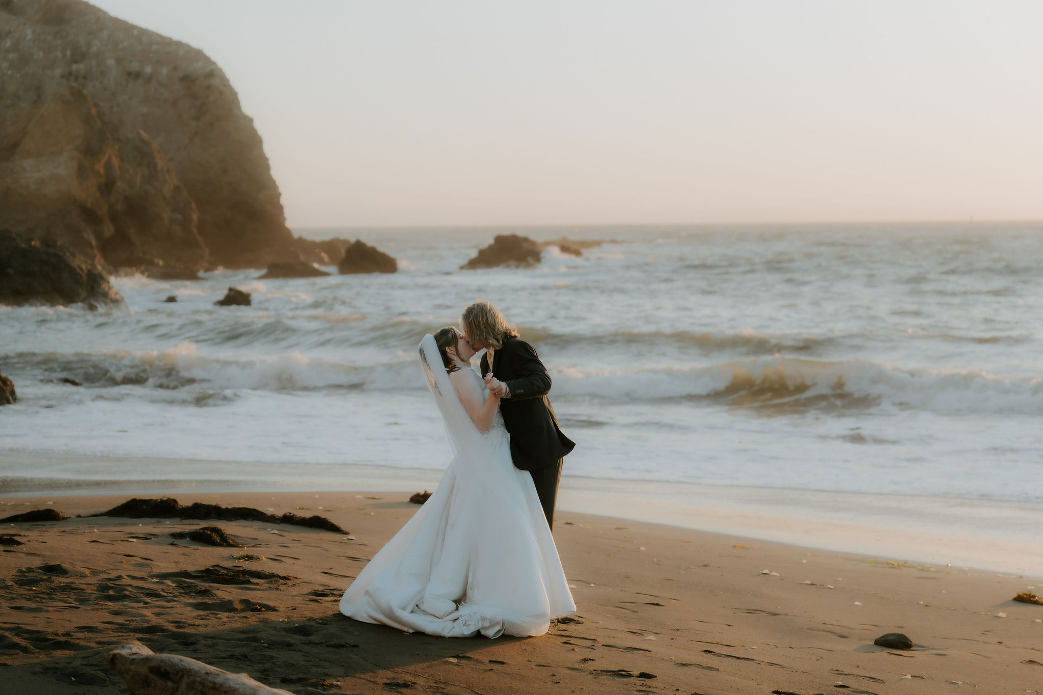 Romantic picture of the newly married couple kissing