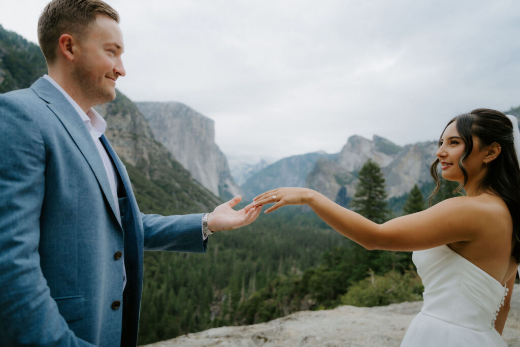 cute picture of the bride and groom holding hands