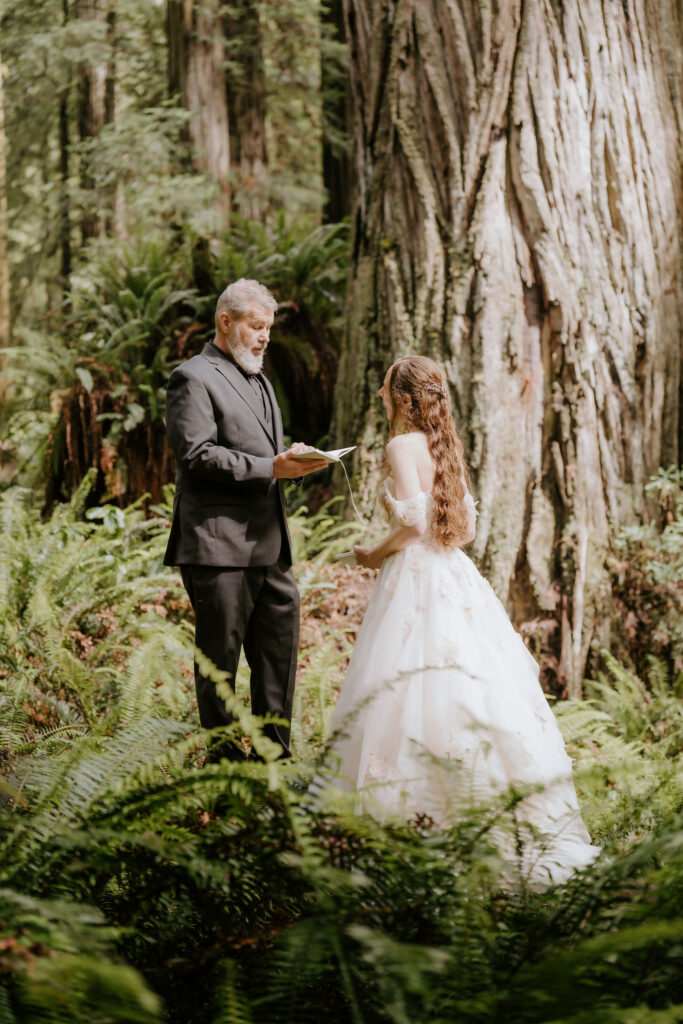 Bride and groom reading their private vows