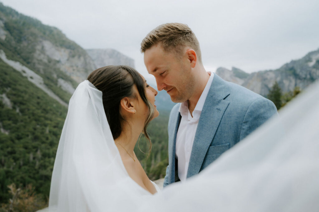 cute picture of the bride and groom smiling at each other