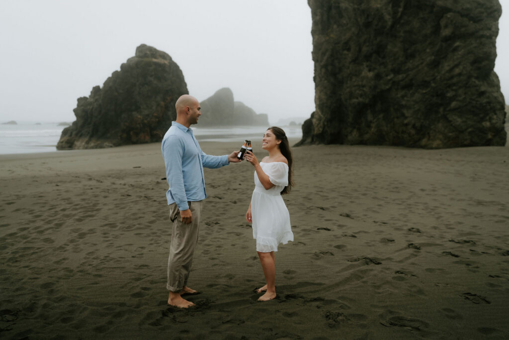 cute picture of the newly engaged celebrating with champagne