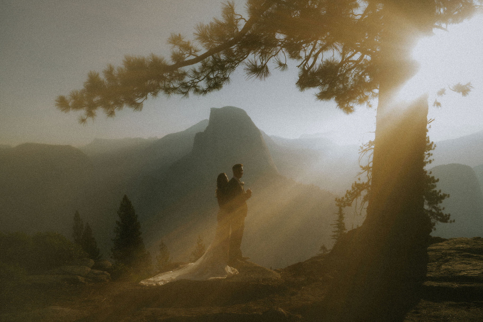 cute picture of the bride and groom kissing