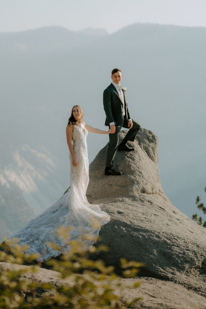 cute portrait of the bride and groom holding hands
