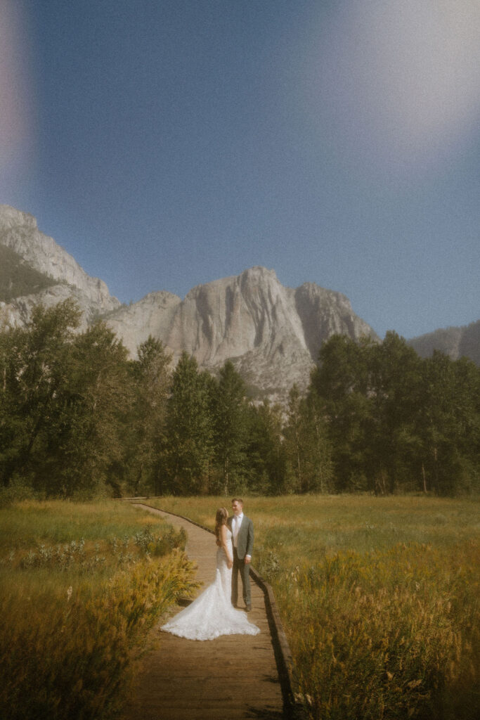 cute picture of the bride and groom kissing