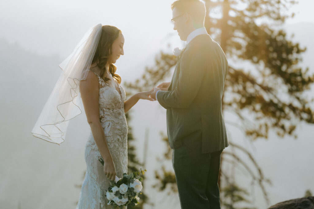 cute picture of the bride and groom holding hands