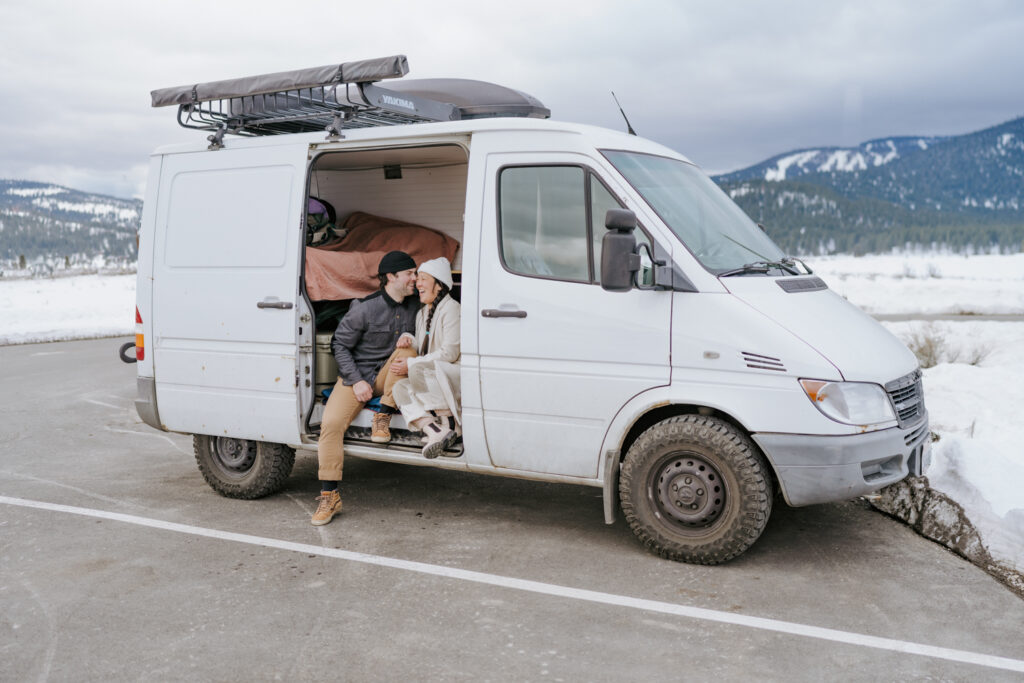 adventure couple in van in lake tahoe