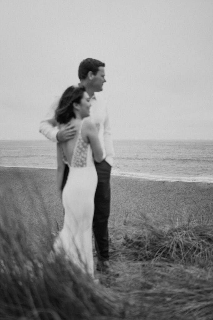 black and white of couple eloping in point reyes