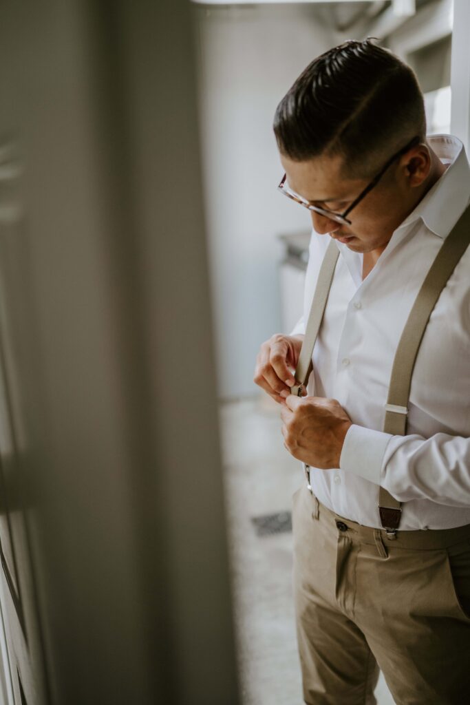 groom getting ready on elopement day